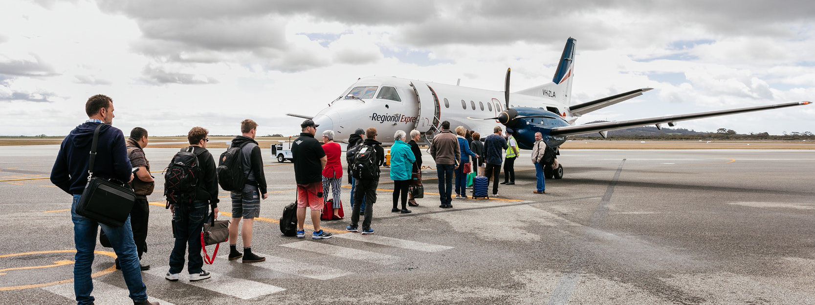 Passengers boarding a Rex Aircraft