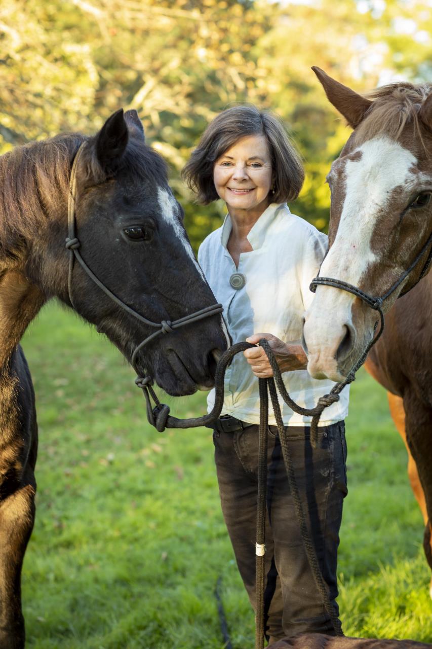 Geraldine Brooks with two horses